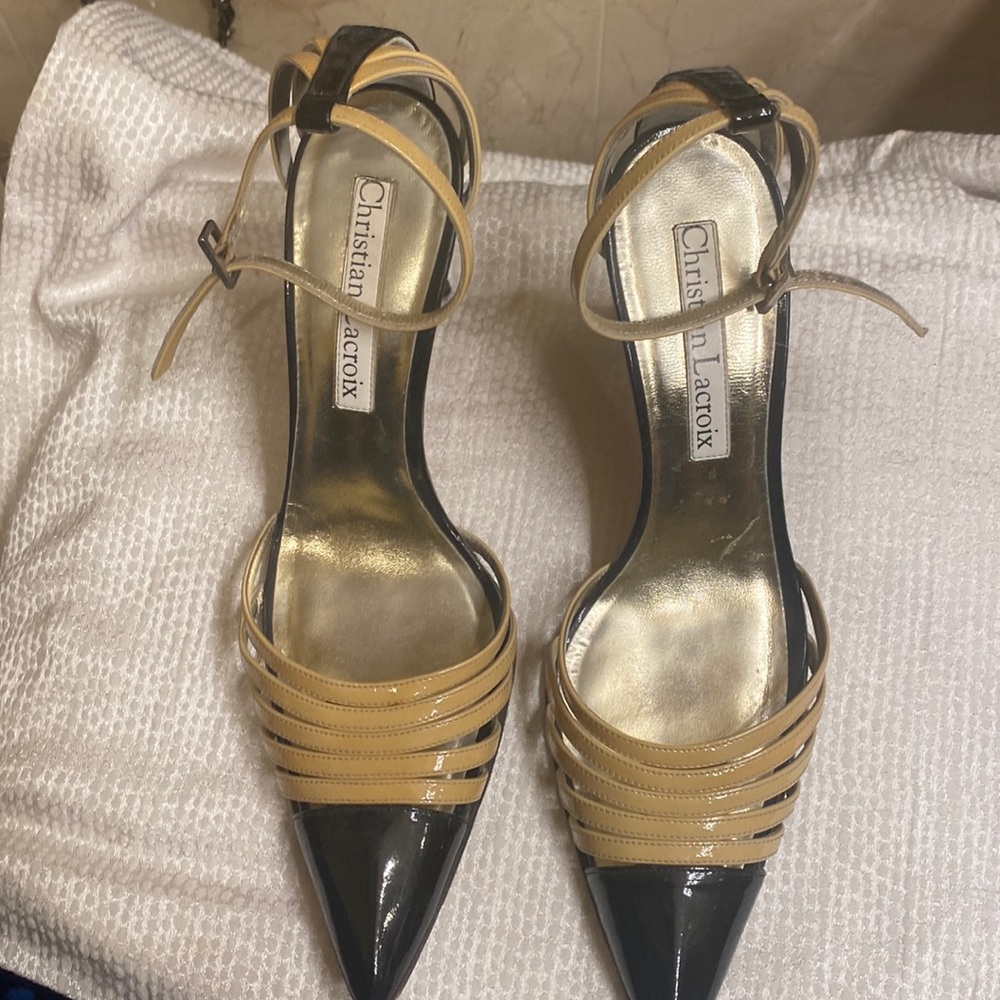 Christian Lacroix Stilletto pointed toes sling back shoes.